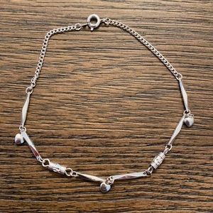 Silver tiny heart bracelet.